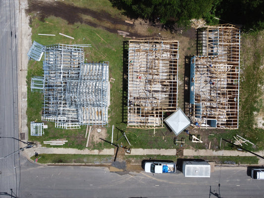 Overhead view of both CFS and wood framing roof systems utilizing truss spacers for ease of installation.