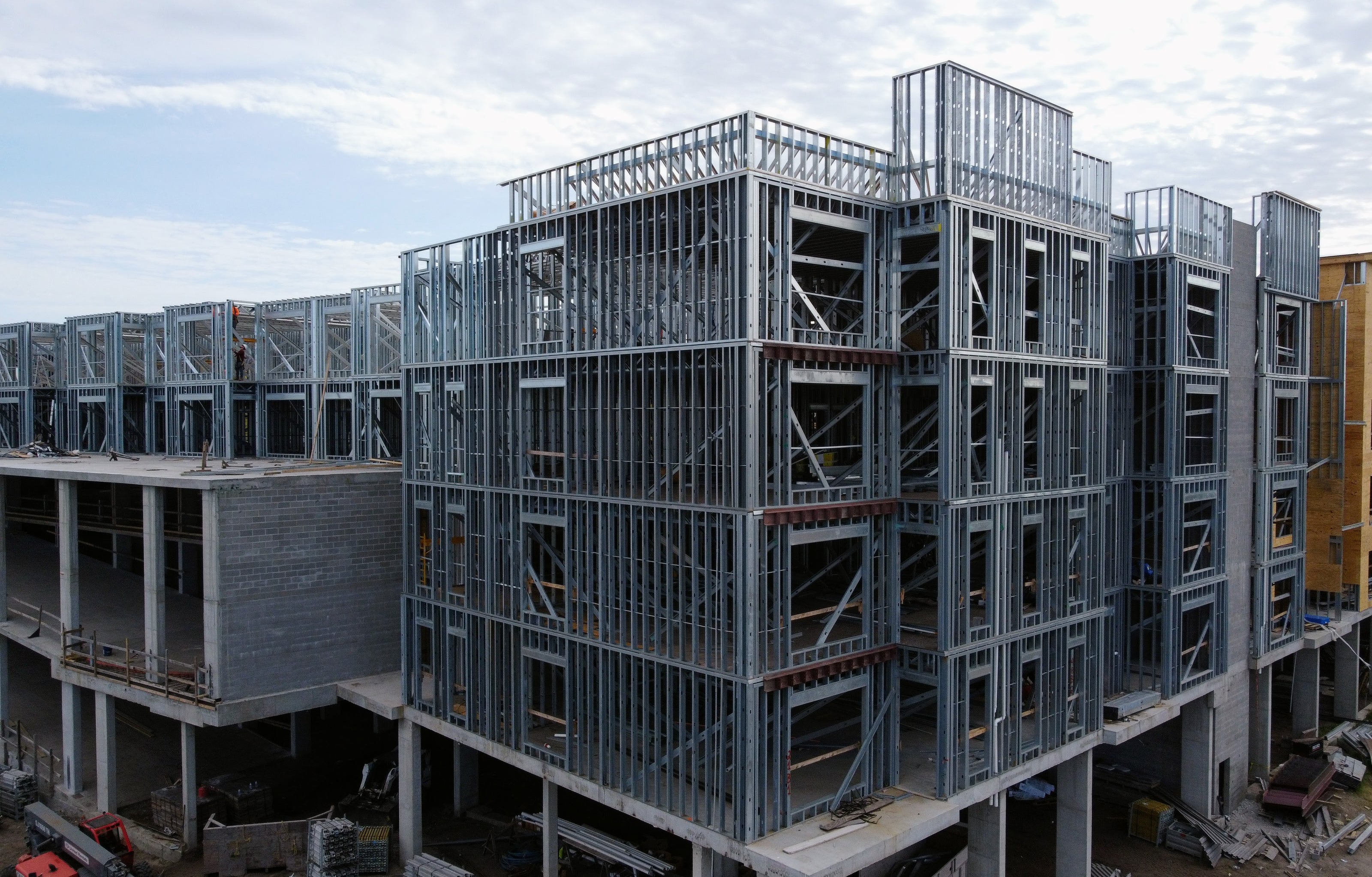 Commerical metal stud multi-family framing using Cold-Formed Steel Connectors like clips, holdowns, bridging and bracing connectors