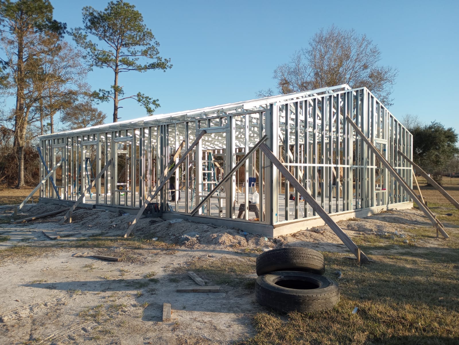 Residential steel framing involving trusses, hurricane ties, holdowns, hurricane straps, built to resist high winds